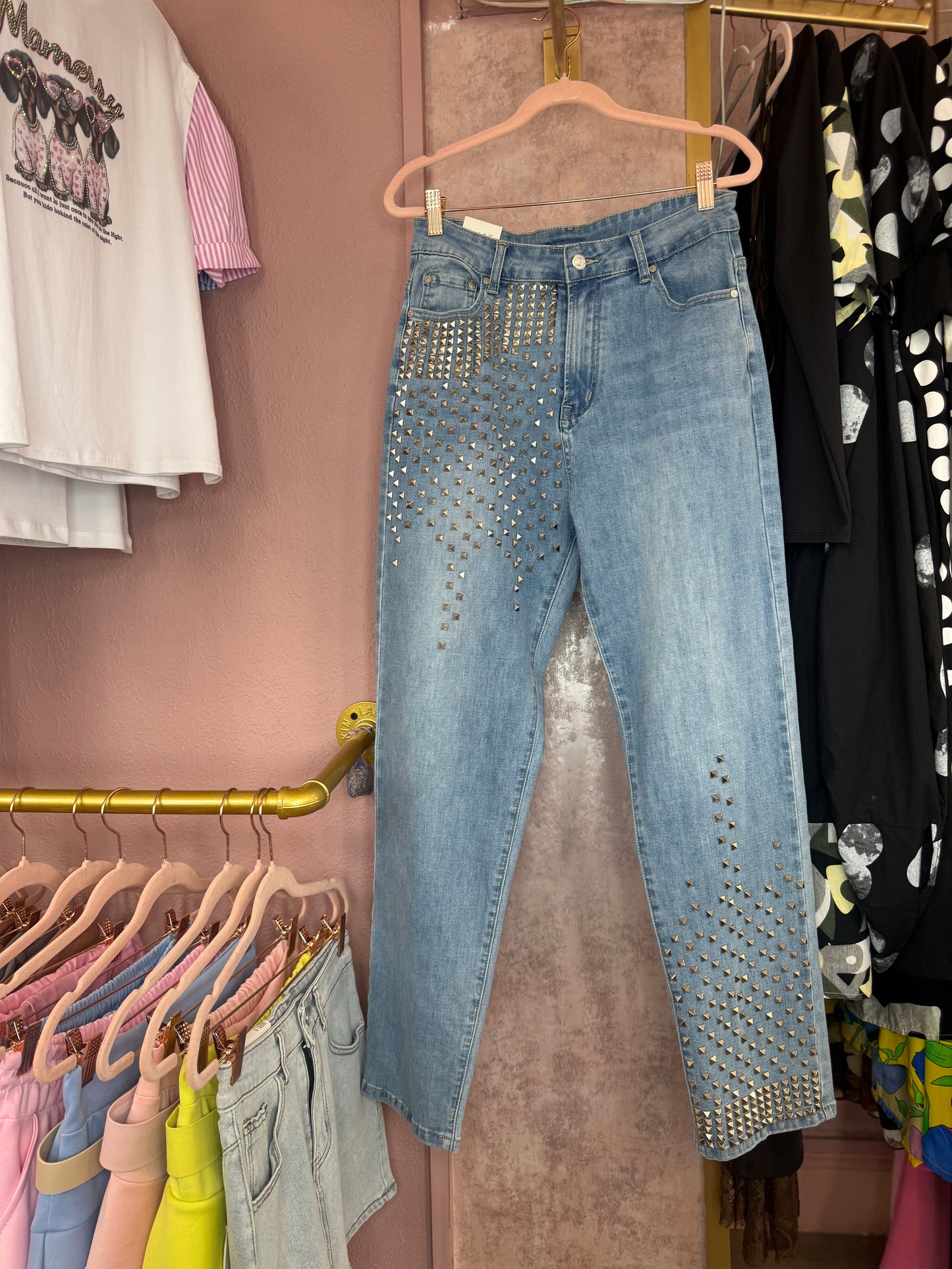 Studded denim jeans š